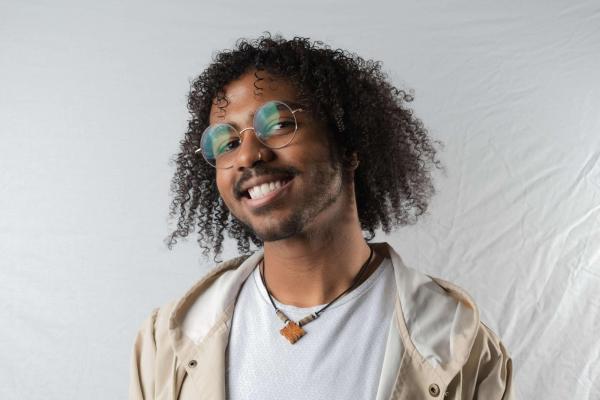 headshot of Aman