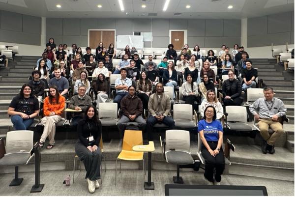 Faculty, Staff, and Students at the 2026 “Math Roadmap” Workshop Hosted by the CU Denver Chemistry Club in a classroom smiling. The room is full.