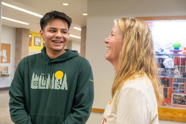 Jami and Rolando laughing together