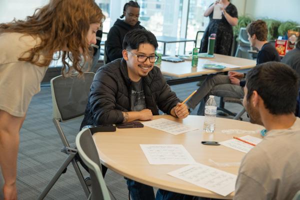student smiles while playing bingo