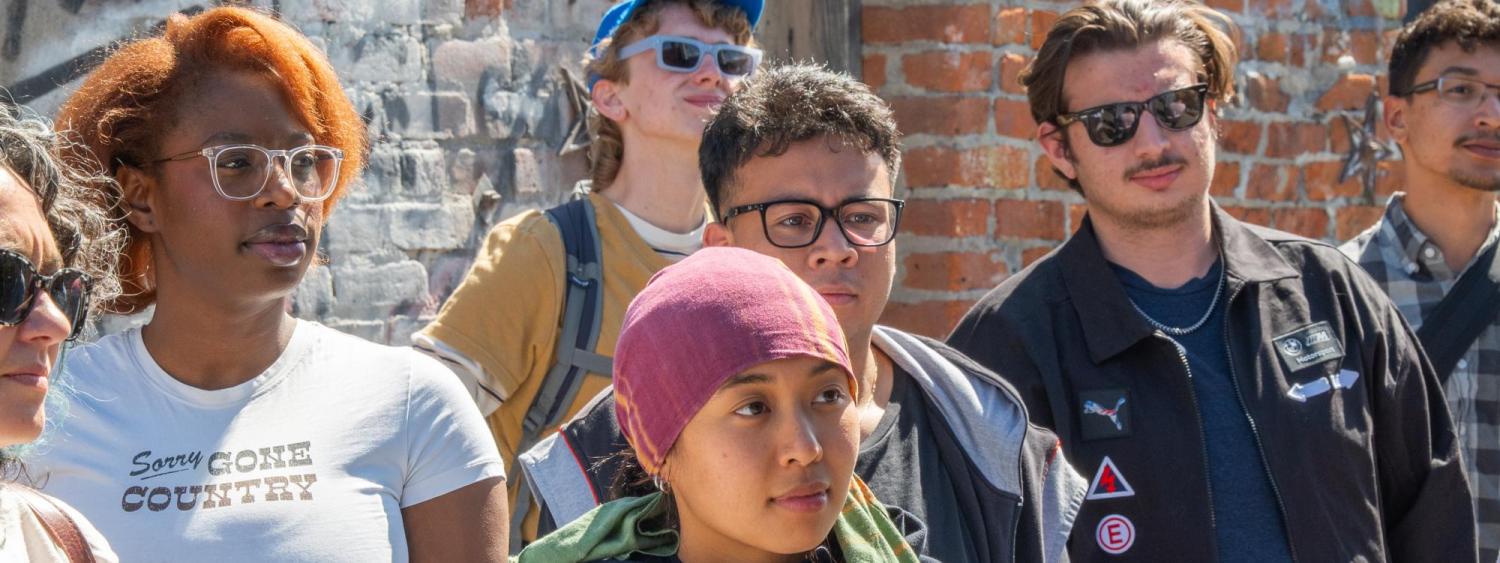 Group of students look on
