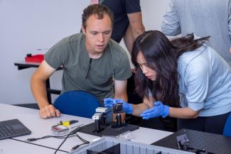 Students work in quantum lab with sensors