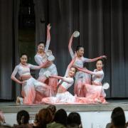 Step Into Melody dance troop performs on stage