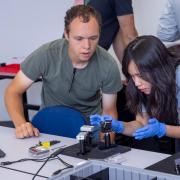 Students work in quantum lab with sensors
