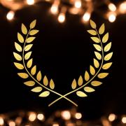 Celebratory fireworks with a laurel wreath to recognize the award won by faculty