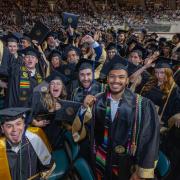 Students at CU Denver graduation celebrating