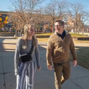 Kurt and Kathleen walk together outside