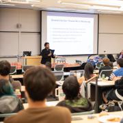 Paul Lopez speaks to classroom - wide shot
