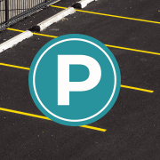 a parking lot with the symbol for parking over it