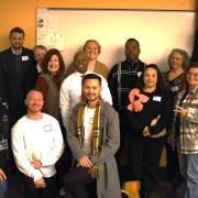 A group of folks involved with the Colorado Prison Education Program, including those from CU Denver