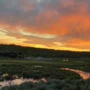 Interacting with nature settings like this one, near Devil's Thumb ranch in Colorado, may reduce stress, increase positive affect, and improve one's attention.