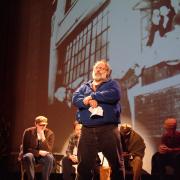 Romero Troupe actor monologues on stage
