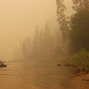 Smoke from Idaho’s Elkhorn fire blankets the Salmon River on July 31, 2023. Photo credit: Brian Maffly.
