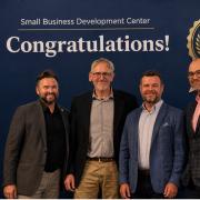 CU Denver Chemistry Professor Scott Reed (second from left) wins first place in AI pitch competition