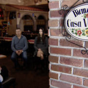 family sits in Casa Vallarta restaurant