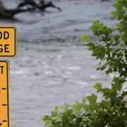 Image of flood level sign in water