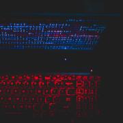 glowing computer screen and computer keyboard