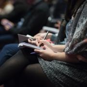 Students taking notes 