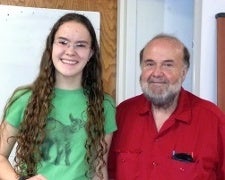 Chair of the Physics Department Clyde Zaidins with a student mentee
