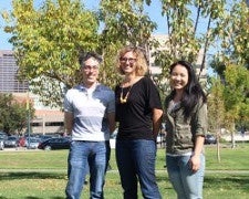 Assistant Professor of Health and Behavioral Sciences Patrick Krueger with student Melanie Tran and Kathryn Dovel