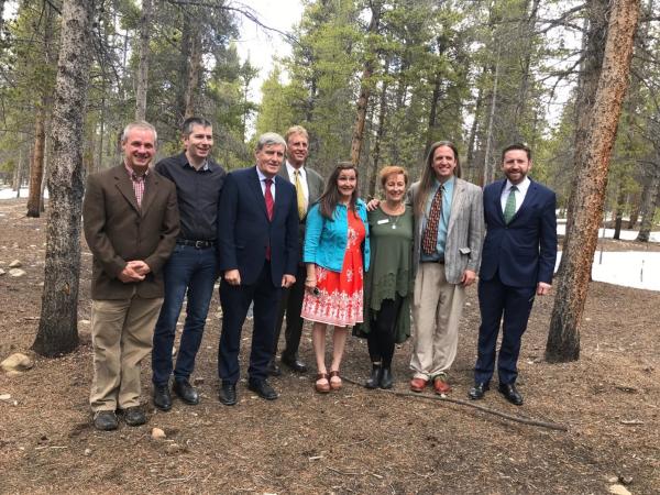 The photo shows Professor Walsh standing in Leadville's Evergreen Cemetery last May with Irish Ambassador Daniel Mulhall (red tie), Irish Consular General Adrian Farrell (green tie),  Leadville Mayor (standing in back), and members of the local Irish Network planning team.