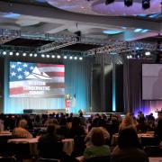 Abby Johnson speaks in front of a crowd at the Western Conservative Summit