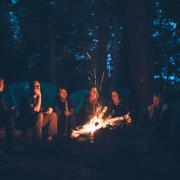 Campfire and people talking