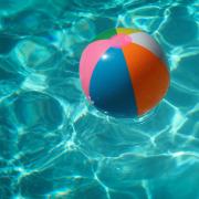 Beach ball in swimming pool