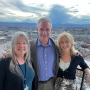 Jim Walsh (center) standing with Dean of CLAS Pam Jansma (left) and Chancellor Michelle Marks (right)