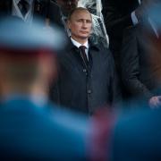 Image of Vladimir Putin, Russia's President, Standing Between Others