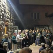 Group gathered around Professor Jim Walsh