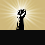 Fist raised in the air to symbnolize the fight for labor rights and unions with rays of light beaming behind it