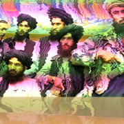 A distorted version of the photo that the Taliban distributed showing them taking over the President's Office in Afghanistan.