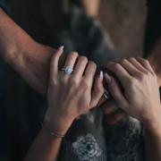 multiple people holding hands