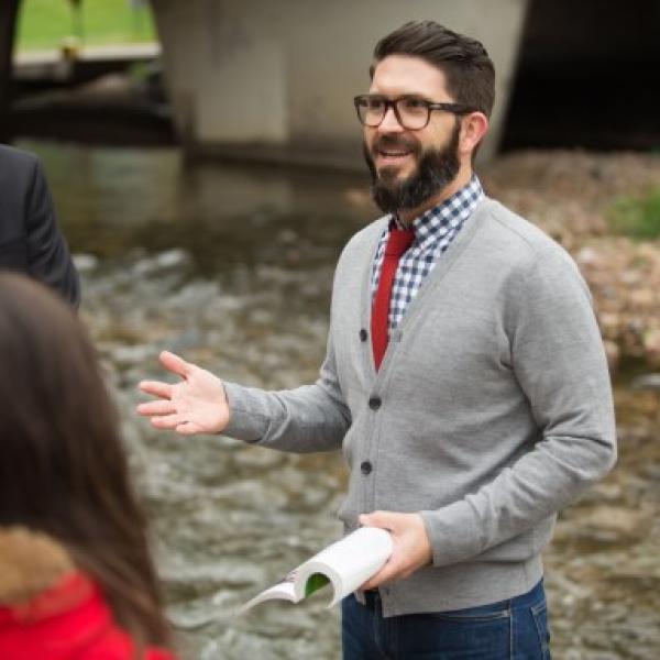 Teacher by a river