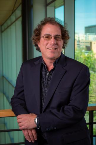 Portrait photo of David Tracer