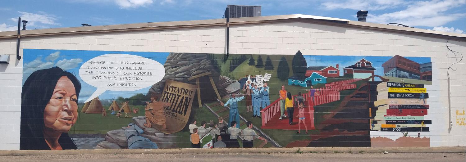 (Mural painted by Adri Norris. Find more of her work at afrotriangledesigns.com and on social media @afrotriangle)  Social forces penetrate all aspects of our personal lives, local communities, and shared worlds. Check our newsletter to get a glimpse of what's happening on our campus, in our city, and throughout our world. 