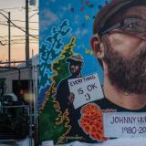 Mural by Robyn Frances, depicting Johnny Hurley, an armed citizen who killed an active shooter who was then gunned down by police. 