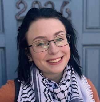 Sydeny McKenzie smiling - headshot