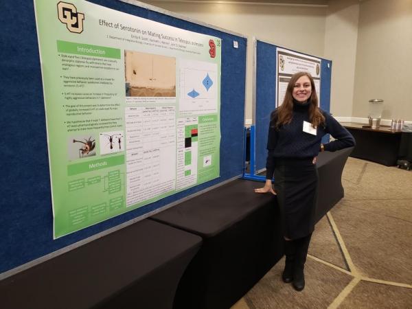 Emily presenting a poster