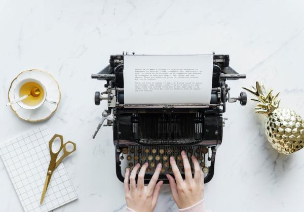 typewriter beverage writing